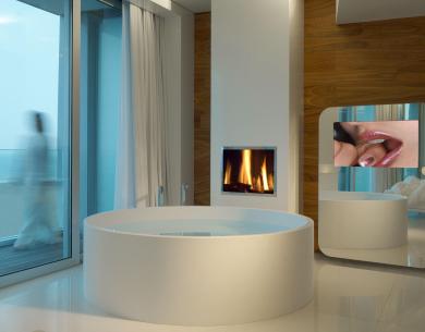 Salle de bain moderne avec cheminée et miroir.