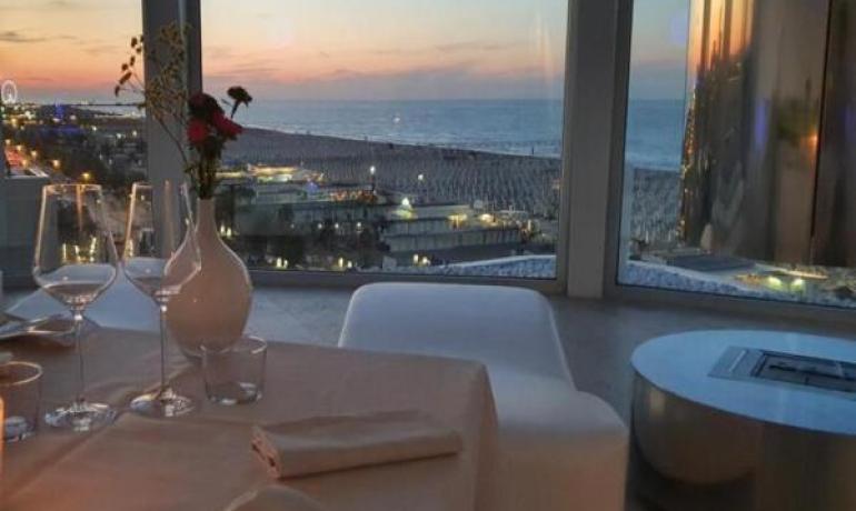Romantic dinner with a sunset sea view.